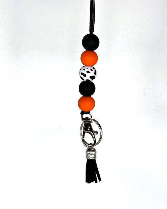 School Pride - Orange and black Cow print